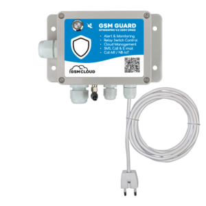 GSM Guard monitoring device with blue label, shield logo, mounted metal housing and a long white power cable.